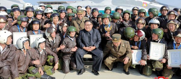 Лидер Северной Кореи Ким Чен Ын на «Боевом полете-2019» в аэропорту Вонсан Калма Лидер Северной Кореи Ким Чен Ын на «Боевом полете-2019» в аэропорту Вонсан Калма - Sputnik Moldova-România
