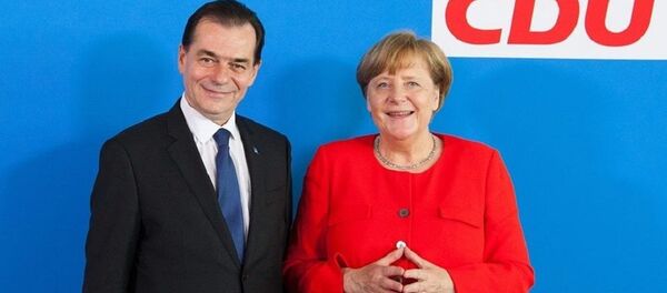 ludovic orban cu angela merkel - Sputnik Moldova-România