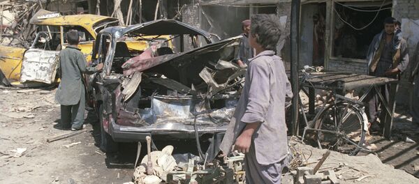 После взрыва заминированной машины на базаре Муратхани в городе Кабул - Sputnik Moldova