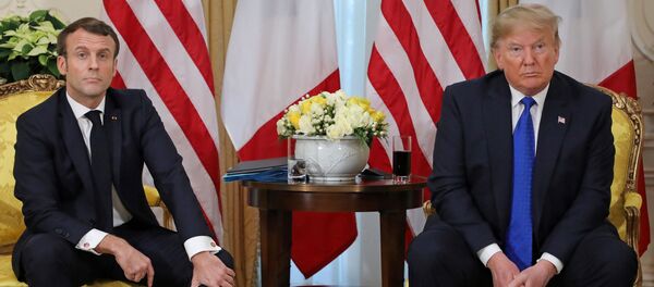  Donald Trump și Emmanuel Macron la Summitul NATO - Sputnik Moldova