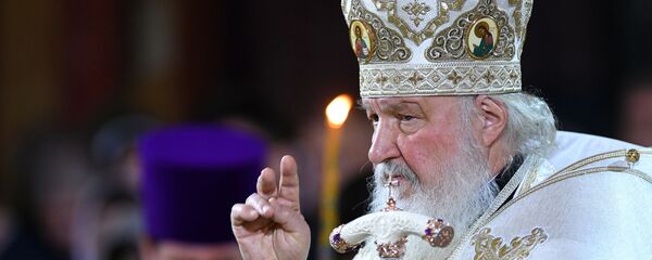 Патриарх Московский и всея Руси Кирилл во время Рождественского богослужения в храме Христа Спасителя в Москве - Sputnik Moldova