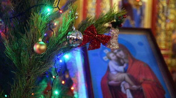 Во время рождественского богослужения в храме Михаила Архангела в Грозном - Sputnik Moldova