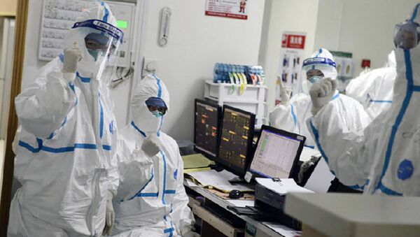 Медицинский персонал больницы в Ухане, Китай - Sputnik Молдова
