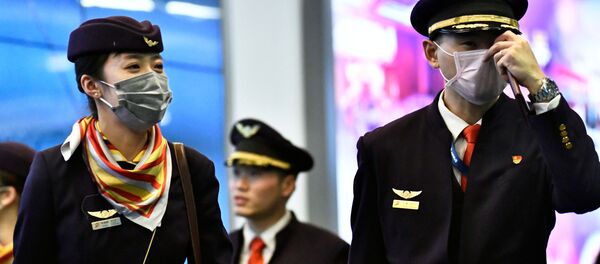 Экипаж воздушного судна в медицинских маска в аэропорту Ванкувера в Ричмонде, Канада Экипаж воздушного судна в медицинских маска в аэропорту Ванкувера в Ричмонде, Канада - Sputnik Moldova-România