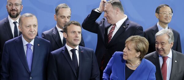  Антониу Гутерреш, Ангела Меркель, Реджеп Эрдоган и президент Франции Эммануэль Макрон на церемонии фотографирования глав делегаций участников Международной конференции по Ливии в Берлине - Sputnik Moldova-România