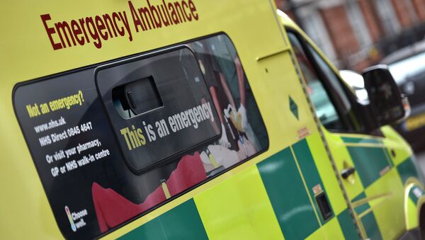 A National Health Service ambulance is seen in central London - Sputnik Moldova-România