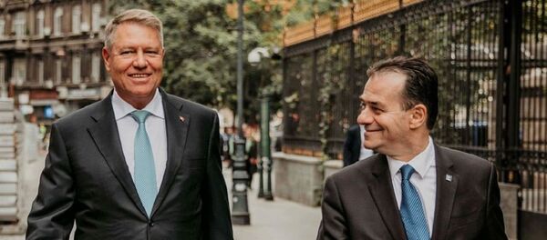 Ludovic Orban și Klaus Iohannis Ludovic Orban și Klaus Iohannis - Sputnik Moldova-România