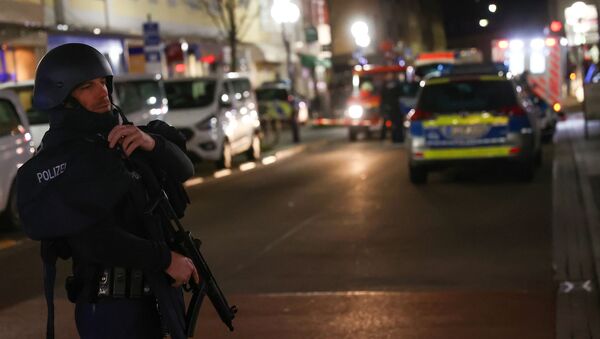 A police officer secures the area after a shooting in Hanau near Frankfurt, Germany, February 19, 2020 - Sputnik Moldova-România