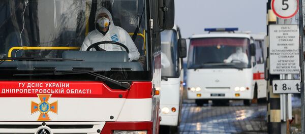 Автобусы с эвакуированными из Китая гражданами украины и других стран в аэропорту Харькова Автобусы с эвакуированными из Китая гражданами украины и других стран в аэропорту Харькова - Sputnik Moldova