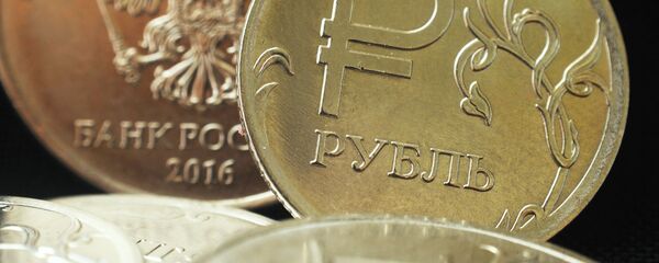 Монета номиналом один рубль. - Sputnik Moldova