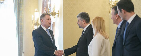 Klaus Iohannis și Marcel Ciolacu - Sputnik Moldova-România