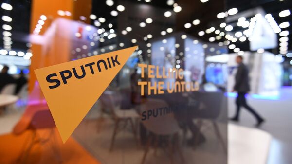 Стенд международного информационного агентства и радио Sputnik - Sputnik Moldova