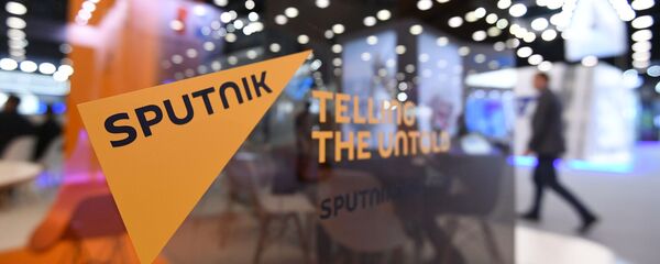 Стенд международного информационного агентства и радио Sputnik - Sputnik Молдова