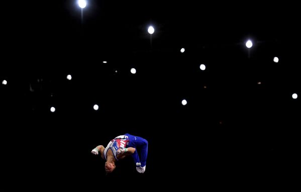 Артур Далалоян в командном многоборье среди мужчин на чемпионате мира по спортивной гимнастике в Штутгарте - Sputnik Молдова