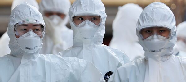 Медицинские работники в защитных костюмах, Южная Корея - Sputnik Moldova