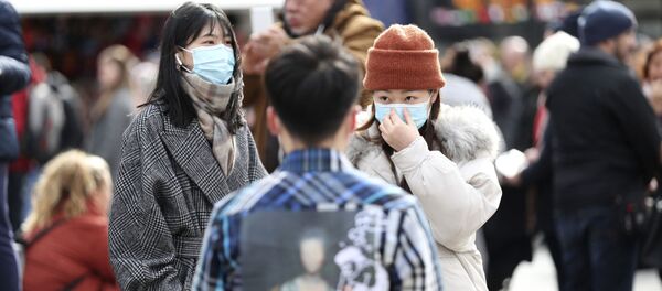 Люди в масках в  Лондоне, Великобритания - Sputnik Молдова
