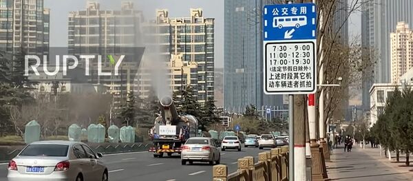Truck seen disinfecting streets of Lanzhou amid coronavirus outbreak Truck seen disinfecting streets of Lanzhou amid coronavirus outbreak - Sputnik Молдова