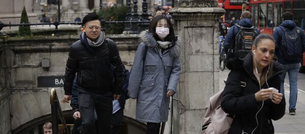 Женщина в лицевой маске из-за распространения коронавируса Женщина в лицевой маске из-за распространения коронавируса - Sputnik Moldova-România