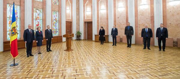 Присяга новых членов правительства от Демпартии Присяга новых членов правительства от Демпартии - Sputnik Молдова