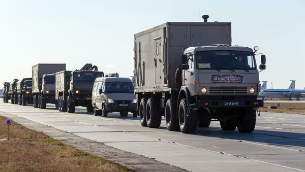 Колонна автомобилей с медицинским оборудованием, предназначенных для отправки в Италию для борьбы с вирусом COVID-19 - Sputnik Moldova-România