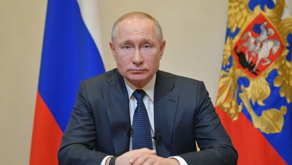 Президент России Владимир Путин во время обращения к гражданам России в связи с коронавирусом  - Sputnik Молдова