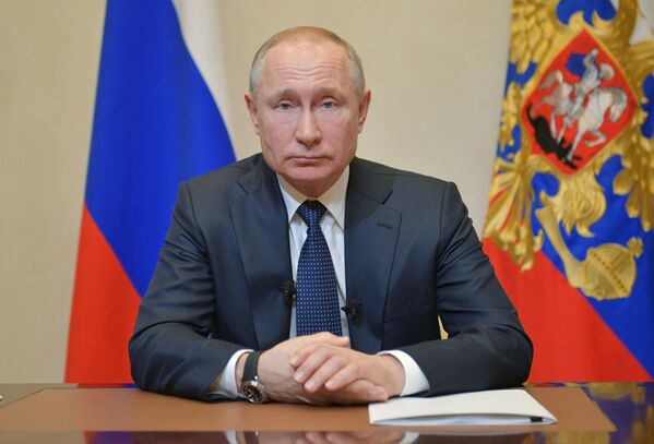 Президент России Владимир Путин во время обращения к гражданам России в связи с коронавирусом  - Sputnik Молдова