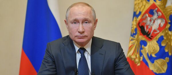 Президент России Владимир Путин во время обращения к гражданам России в связи с коронавирусом  - Sputnik Молдова