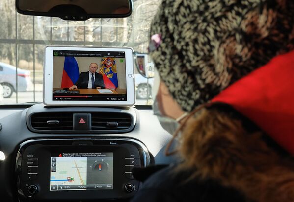 Трансляция обращения президента России В. Путина к гражданам из-за ситуации с коронавирусом - Sputnik Молдова