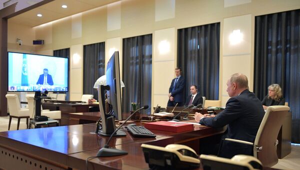 Президент РФ В. Путин принял участие в саммите лидеров Большой двадцатки по коронавирусу в режиме видеоконференции - Sputnik Молдова