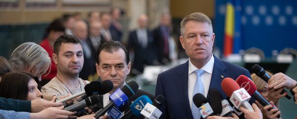 Ludovic Orban și Klaus Iohannis Ludovic Orban și Klaus Iohannis - Sputnik Moldova-România