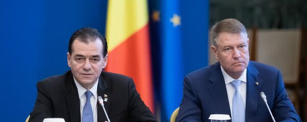 Ludovic Orban și Klaus Iohannis - Sputnik Moldova-România