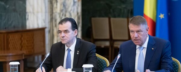 Ludovic Orban și Klaus Iohannis - Sputnik Moldova-România