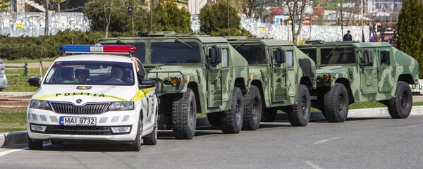 Militari pe o stradă din Chișinău Militari pe o stradă din Chișinău - Sputnik Moldova