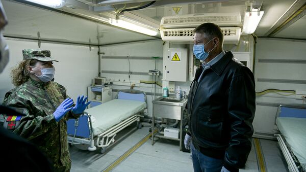 Klaus Iohannis în vizită la Spitalul Militar de Campanie ROL II, secție externă a Spitalului Militar Central - Sputnik Moldova-România