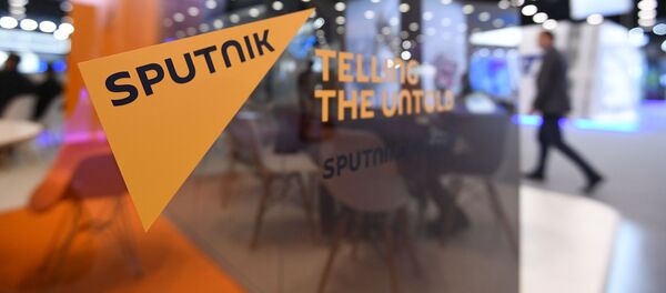 Стенд международного информационного агентства и радио Sputnik - Sputnik Moldova