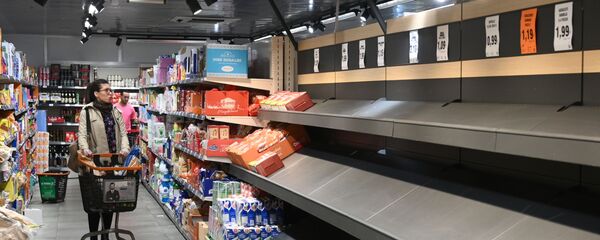Пустые полки в супермаркете в Мадриде Пустые полки в супермаркете в Мадриде - Sputnik Молдова