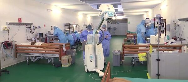 Работа российских военных врачей в полевом госпитале в Бергамо Работа российских военных врачей в полевом госпитале в Бергамо - Sputnik Moldova-România