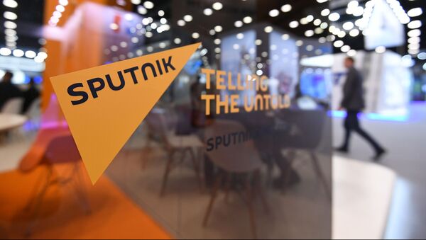 Стенд международного информационного агентства и радио Sputnik - Sputnik Молдова