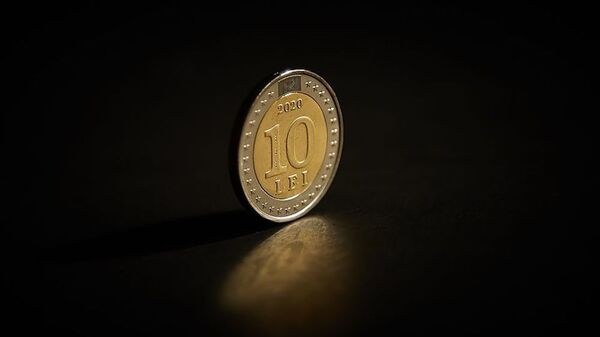 В Молдове к 30-летию государственного флага выпустили новую 10-леевую монету. - Sputnik Молдова