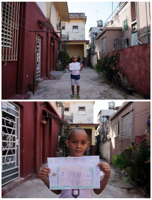 Кристофер Лукас Рейес, 7 лет, из Гаваны, с рисунком, изображающим ее и маму внутри дома, а папу-врача снаружи, а также коронавирус, падающий с неба - Sputnik Moldova-România
