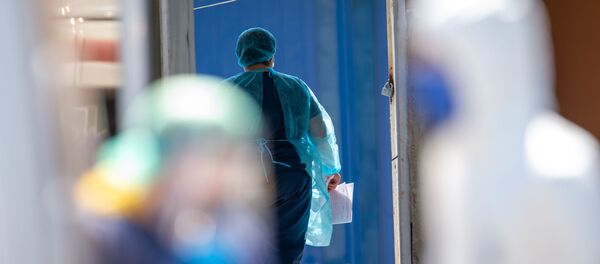 Медицинский персонал инфекционной больницы Норк - Sputnik Молдова