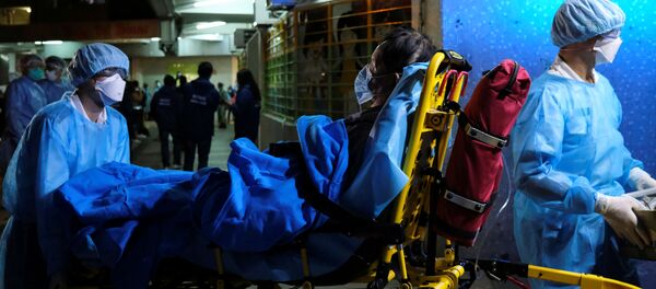 Госпитализация больного с коронавирусом Госпитализация больного с коронавирусом - Sputnik Moldova-România