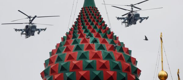 Ударные вертолеты Ка-52 Аллигатор на репетиции воздушной части парада Победы в Москве Ударные вертолеты Ка-52 Аллигатор на репетиции воздушной части парада Победы в Москве - Sputnik Молдова