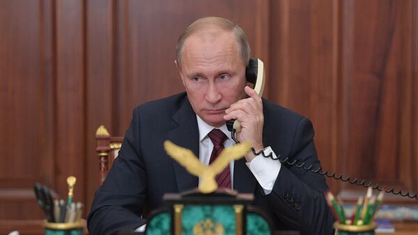 Президент РФ В. Путин провел телефонный разговор с главами ДНР А. Захарченко и ЛНР И. Плотницким - Sputnik Moldova-România