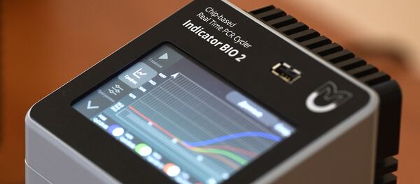 Демонстрация диагностики для обнаружения коронавируса центром ФМБА России Демонстрация диагностики для обнаружения коронавируса центром ФМБА России - Sputnik Moldova-România