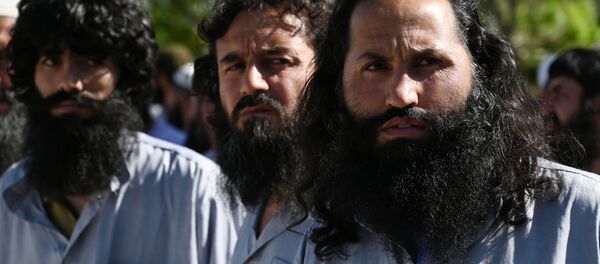 Заключенные талибы во время их освобождения из тюрьмы Баграм, Афганистан Заключенные талибы во время их освобождения из тюрьмы Баграм, Афганистан - Sputnik Молдова