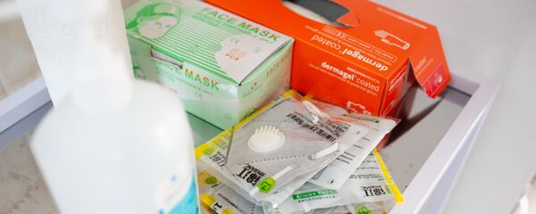 Защитные маски, перчатки, антисептик - Sputnik Moldova