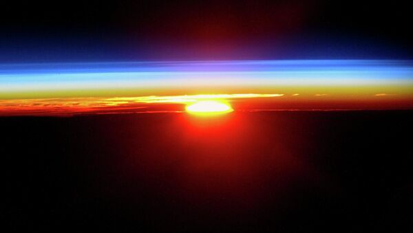 Закат солнца с борта Международной космической станции - Sputnik Молдова
