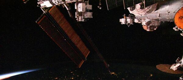Космические сумерки с борта Международной космической станции Космические сумерки с борта Международной космической станции - Sputnik Молдова