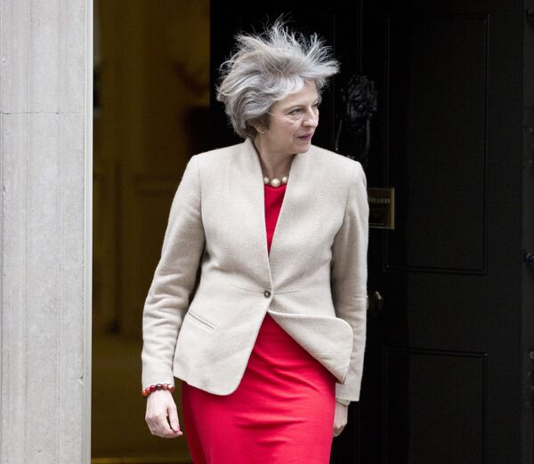 Премьер-министр Великобритании Тереза Мэй на Даунинг-стрит в Лондоне, 2017 год - Sputnik Молдова